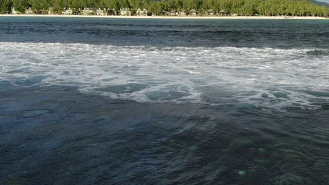 Ocean breaking shallow waves view to coastline Stock Footage 120426599