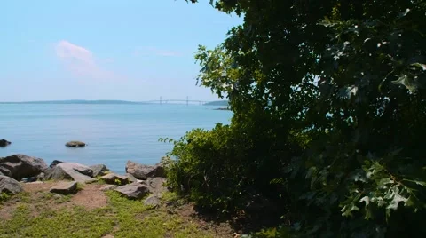 The ocean with bridge in distance Stock Footage 67288828