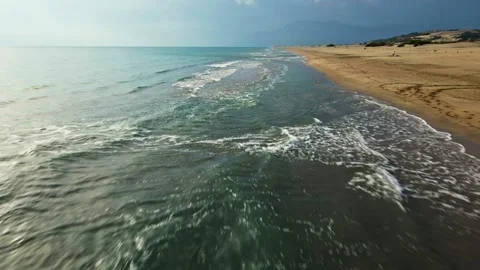 The ocean is calm and the beach is sandy Stock Footage 327914111