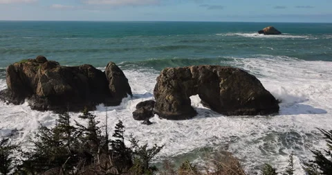 The ocean is calm and the rocks are large Stock Footage 270469489