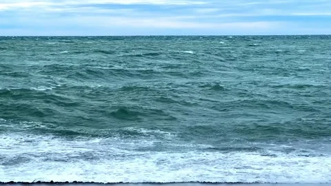 The ocean is calm and the sky is cloudy Stock Footage 276719881