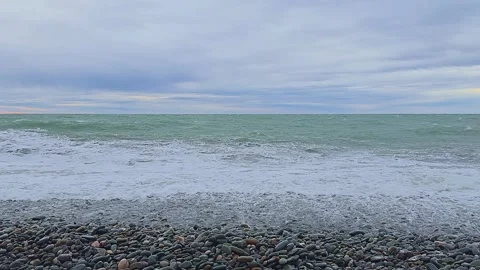 The ocean is calm and the sky is cloudy 스톡 동영상 277258410