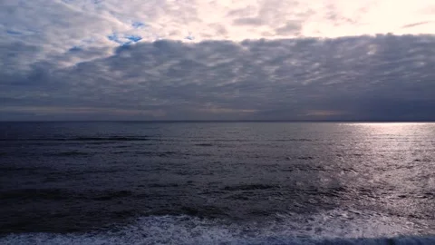 The ocean is calm and the sky is cloudy Stock Footage 305874397