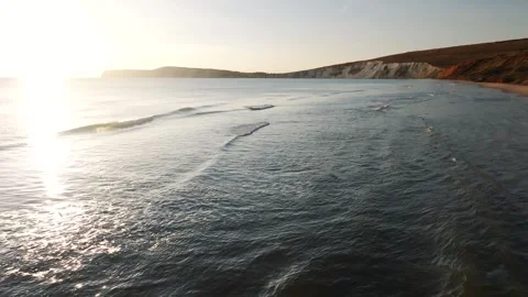 The ocean is calm and the sun is shining on the water Stock Footage 297951067
