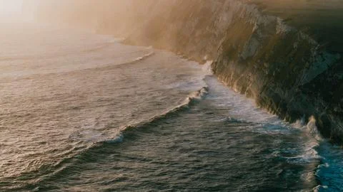 The ocean is calm and the waves are small Stock Photos