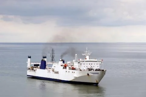 Ocean cargo ship sheltered from a storm in the bay of the port, Batumi, Georg Stock Photos