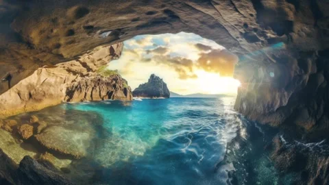 An Ocean Cave With A View Of The Sunset Stock Footage 242363919