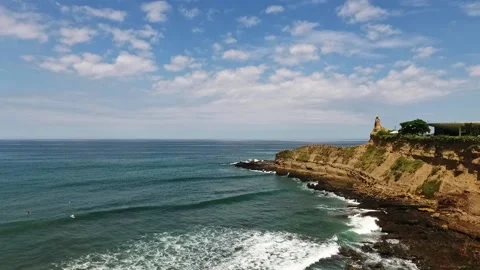 Ocean with cliff and waves in a beautiful day Stock Footage 145153139