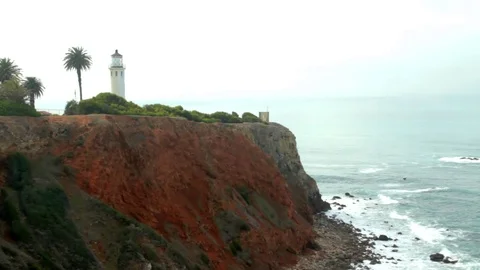 Ocean Cliff Lighthouse Waves Crash 2 Stock Footage 79032064