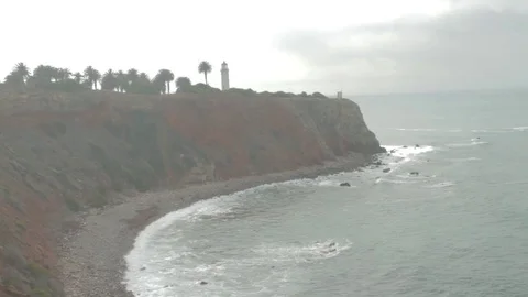 Ocean Cliff Lighthouse Waves Crash Stock Footage 79032127