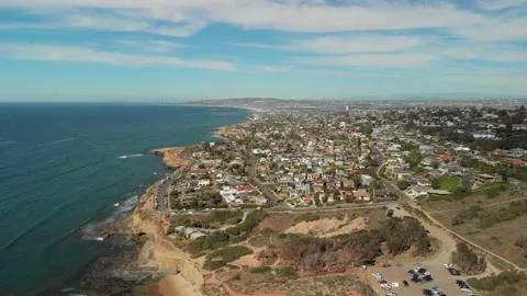 Ocean, cliffs, and neighborhoods Video stock 221379082