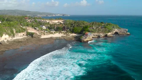 Ocean Cliffs Pan with Lightleak Stock Footage 90125550