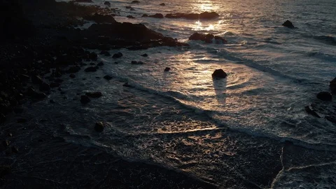 Ocean coast at sunset in sloumo, view from above Stock Footage 108564177