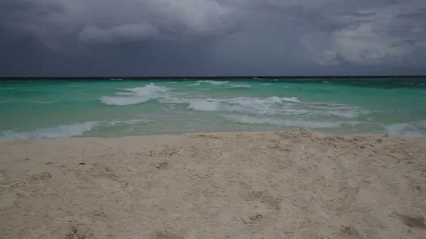 Ocean currents from both sides on the beach Stock Footage 82495589