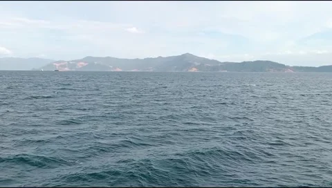 Ocean currents small waves with Indonesian natural background Stock Footage 277922479