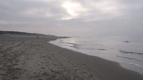The ocean at De koog Beach on Texel Island - 3840 x 2160 @ 29.97fps Stock Footage 240349027