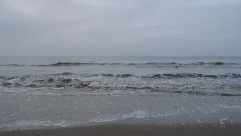 The ocean at De koog Beach on Texel Island - 3840 x 2160 @ 29.97fps Stock Footage 240351083