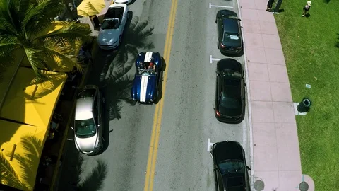 Ocean drive car traffic blue antique car 1 Stock Footage 103516213