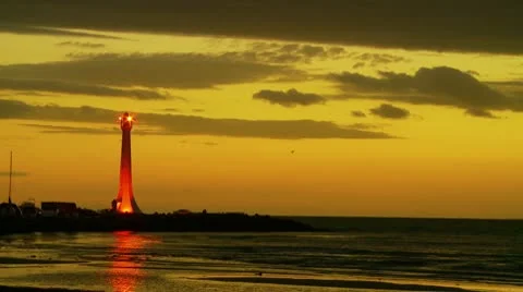 Ocean Dusk With Lighthouse Stock Footage 10564944
