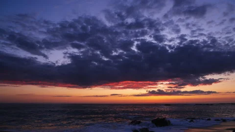 Ocean at dusk time lapse. Beautiful colorful sunset sky. Stock Footage 130627432