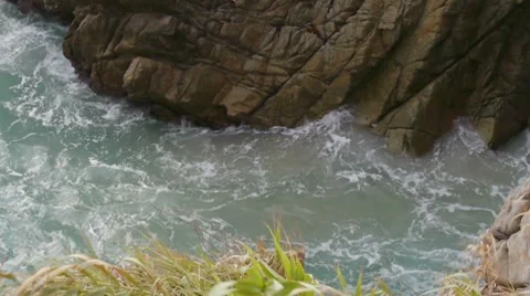 Ocean Entering Between Cliffs Stock Footage 7869673