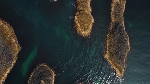 Ocean fly over, Above rocks islands in the ocean Stock Footage 211802383