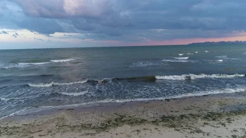 Ocean fly over,H just above the ocean waves facing the sunrise . Stock Footage 80942691