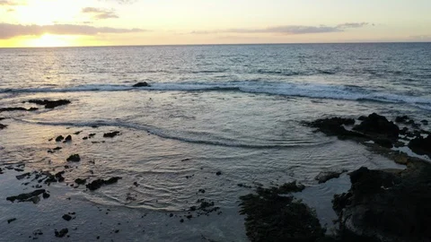 Ocean flyover at sunset Video stock 129045669