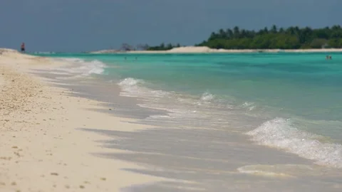Ocean front view of waves breaks on tropical white sand beach - Barbados Stock Footage 171170105