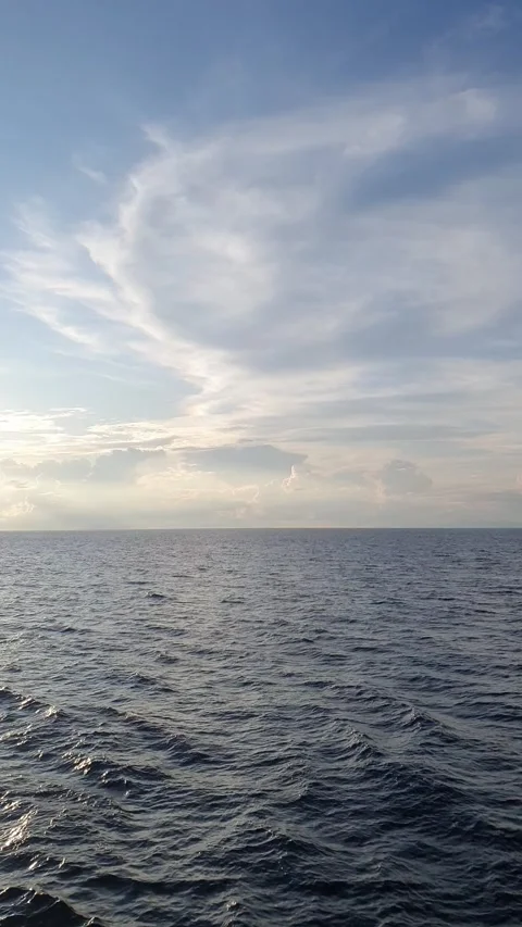 Ocean with green mountain background Stock Footage 294019485