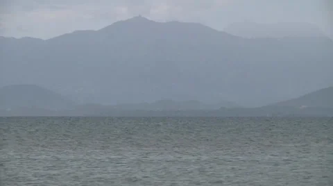 Ocean haze and mountains Video stock 33254479