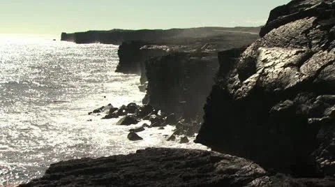 Ocean Hitting Cliffs Formed By Volcanic Lava 스톡 동영상 19290350