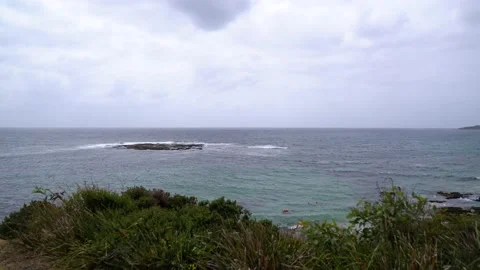 Ocean horizon with spearfishers Stockbeeldmateriaal 130367882