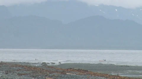 Ocean Kayakers in Waves on Gray Day 2 Stock Footage 8558111