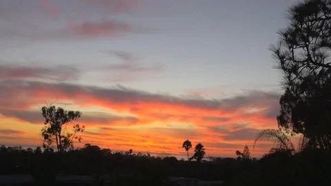 Ocean Land Sunset Pan Stock Footage 99417156