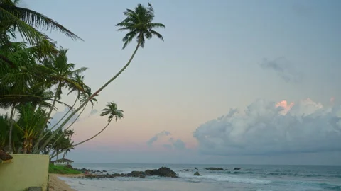 Ocean landscape with small foam waves on tropical resort with sandy beach and Stock Footage 253191849