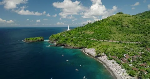 Ocean lighthouse perched on cliff with stunning aerial view Stockbeeldmateriaal 276282245