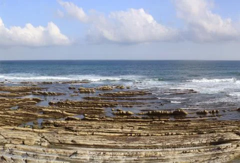 Ocean at low tide Stock Photos