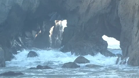 Ocean Making New Arch at Pfeiffer Beach Stock Footage 64821490