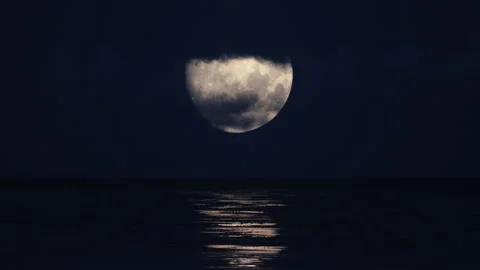 Ocean Moon Night - Clouds Passing Full Moon - Realistic, Telephoto, Real Time Stock Footage 160325360