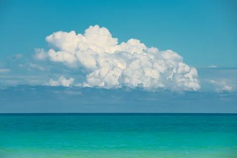 Ocean. Ocean background. Blue sky with white fluffy cloud. Atlantic Ocean Stock Photos
