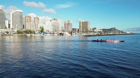 Ocean outrigger canoe team rowing in slow motion Stock Footage 247599209