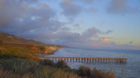 Ocean pier and train trestle Stock Footage 119794713