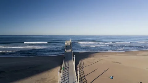 Ocean pier fly foward Stock Footage 145343475
