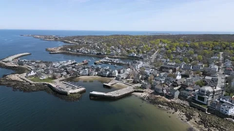 Ocean pier town sky view with blue skies and boats Stock Footage 239794601