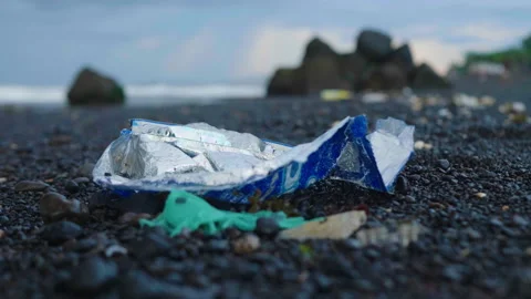 Ocean Plastic on Black Sand Beach, Bali Stock Footage 147285799