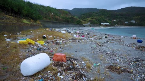 Ocean Plastic Refuse Washes up on Remote Oki Islands after Storm in Japan Stock Footage 328385012