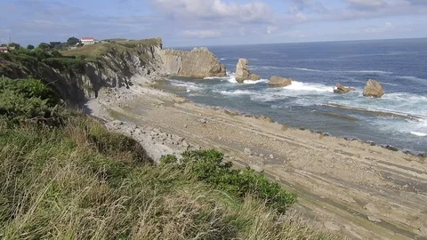 Ocean in Playa de Arnia Beach 5 in Santander Spain España  4K Video stock 115936763