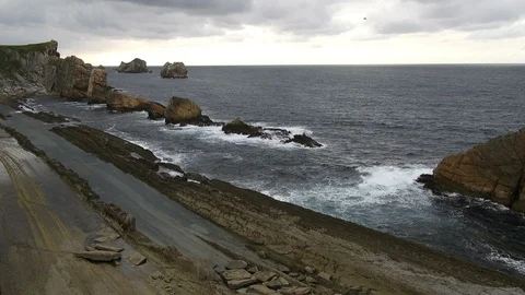 Ocean in Playa de Arnia Beach 3 in Santander Spain 4K Stock Footage 115942279