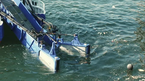 Ocean pollution concept. Special trash collector utility boat collecting plastic Stock Footage 172039273